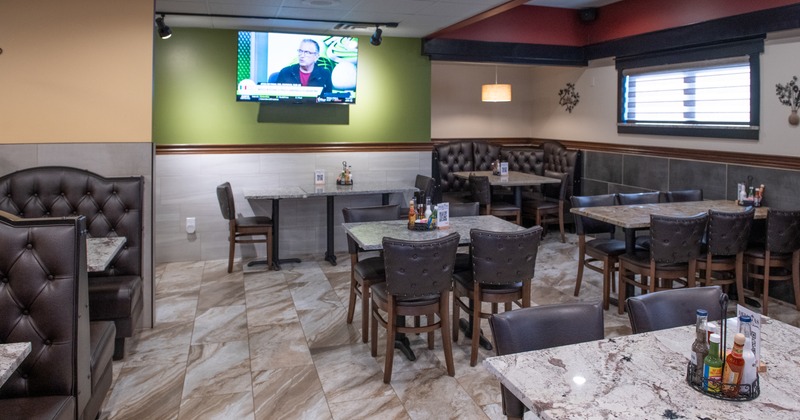 Diner area, wise angle view to diner room, tables, chairs, booths