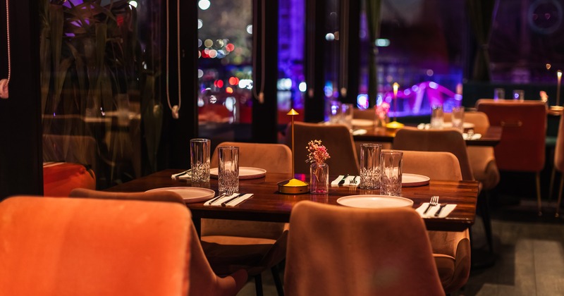 An elegant dining table set for four guests