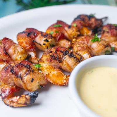 Grilled bacon wrapped shrimp.