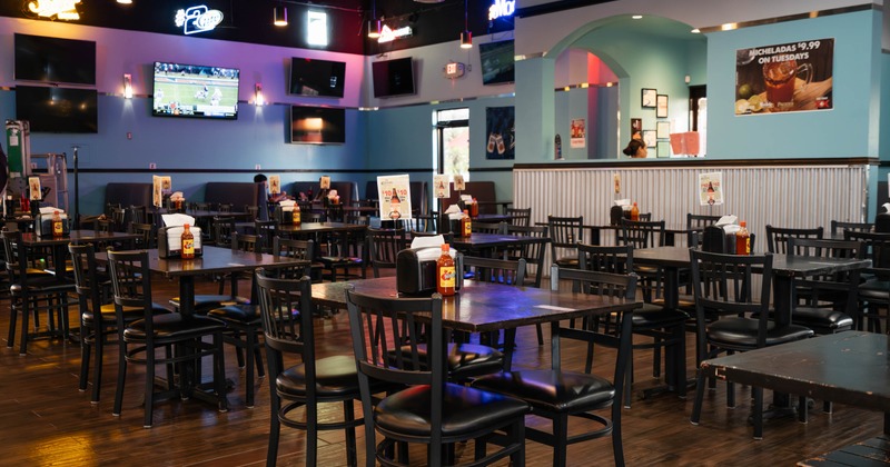 Interior, seating area with tables and chairs
