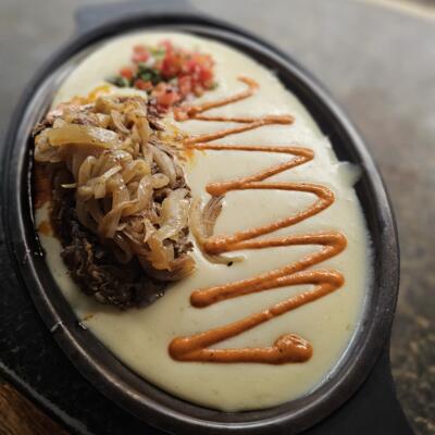 Best Queso & Birria Dip in Raleigh - at 13 Tacos and Taps.