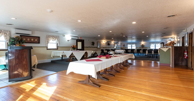 Interior, a long table in the middle of the room