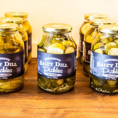 Salty dill pickle jars.