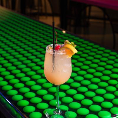 Served cocktail in long stem glass.