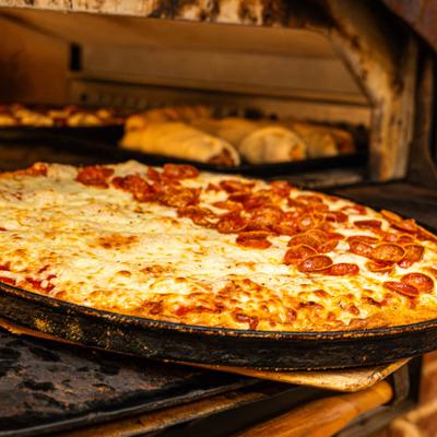 Large half-cheese, half-pepperoni pizza.