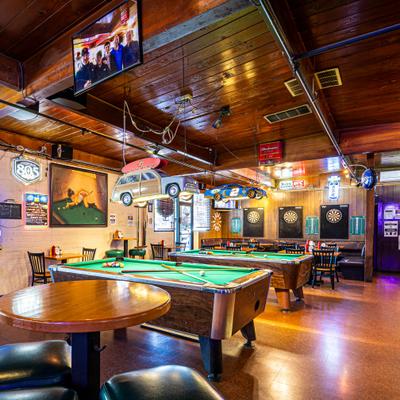 Pool Tables and Dart Boards on the Bar Room Floor..