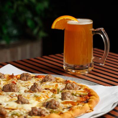 Large house pizza and beer.