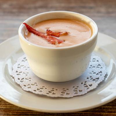 Lobster bisque soup with lobster garnish.