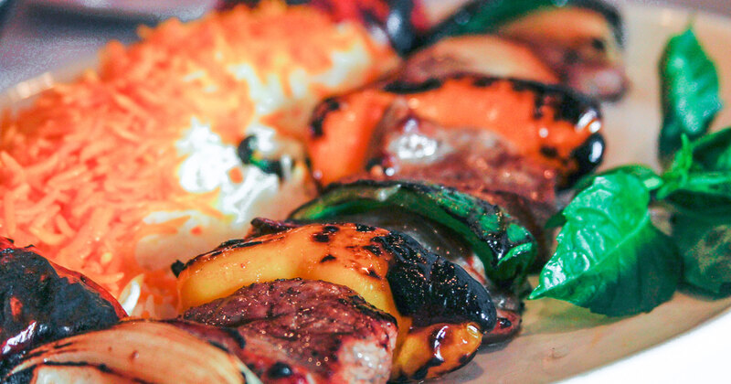 Grilled veggies and meat skewers extreme closeup