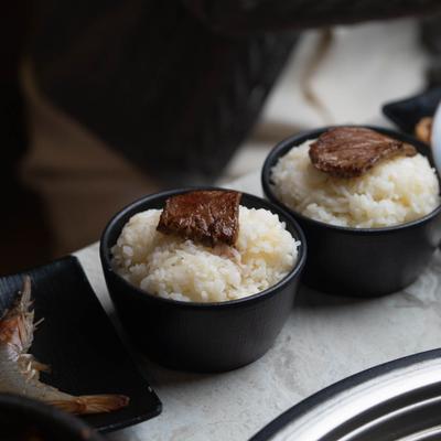 Bowls of rice with beef.