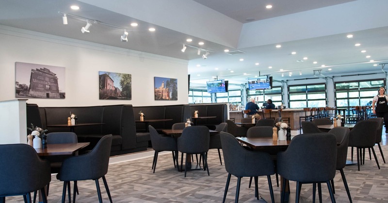 Interior, chairs and tables and restaurant booths in the background