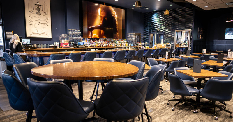 Interior, bar, tables and chairs for guests