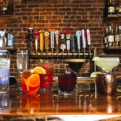 Various drinks and cocktails served on the bar.