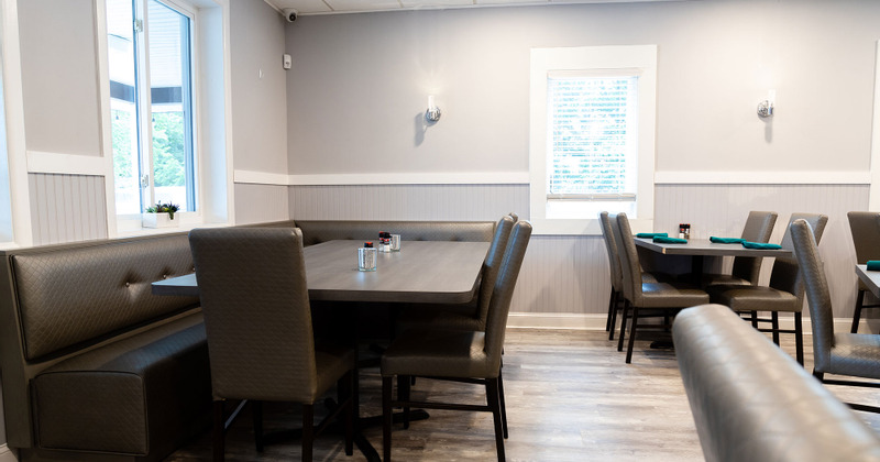 Interior, tables in the corner by the windows