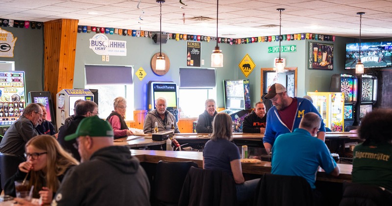 Customers sitting at the bar