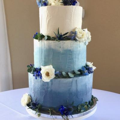 Blue and white three tier cake