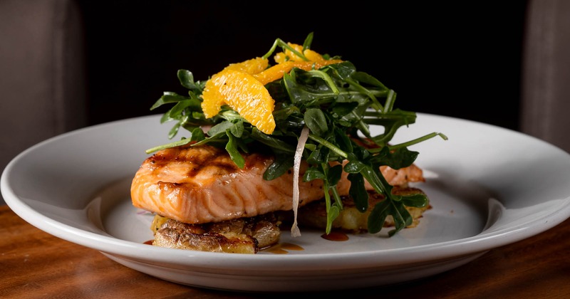 Glazed salmon, with citrus arugula salad, and potatoes