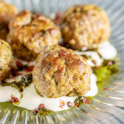 Lamb Meatballs / Polpette di Agnello Warm spices, yogurt, mint pesto, and pink peppercorns.