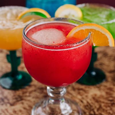 Strawberry Margarita with other cocktails in the background.