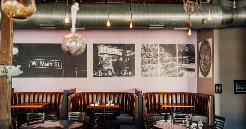 Seating area with booths, chairs and tables