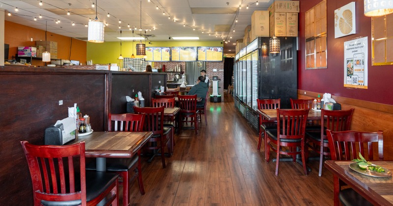 Interior of the restaurant, dining area, tables and chairs
