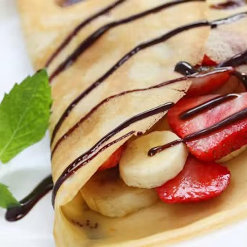 menu item 70 of 138, Crepe Strawberries, Banana, and Cream