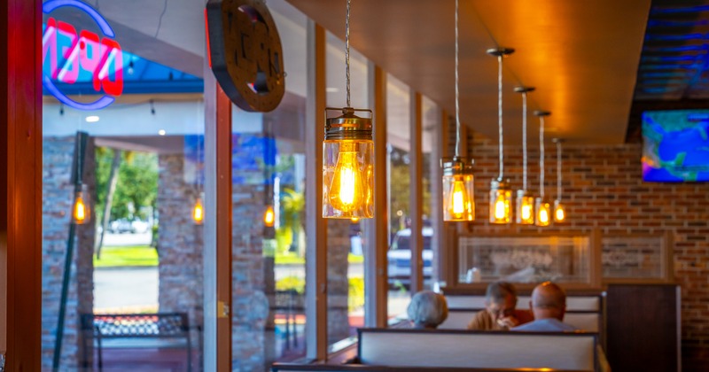 Line of booths by window