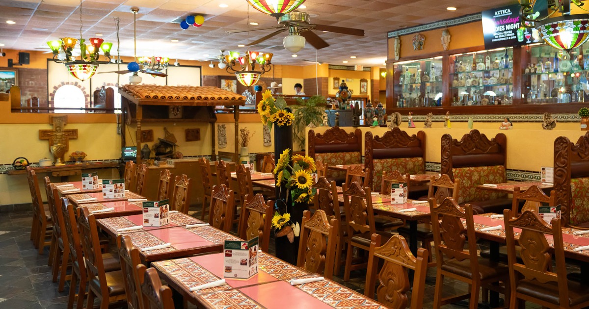 Interior, tables and chairs ready for guests