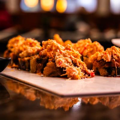 Volcano Rolls, with tuna, cream cheese, avocado, crab sticks, and crab salad.
