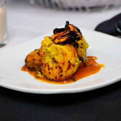 Served Shrimp marinated in yogurt and spices.