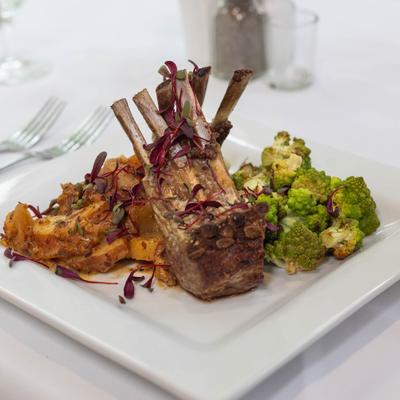 Rack Of Lamb, Microgreens, Roasted Vegetables.