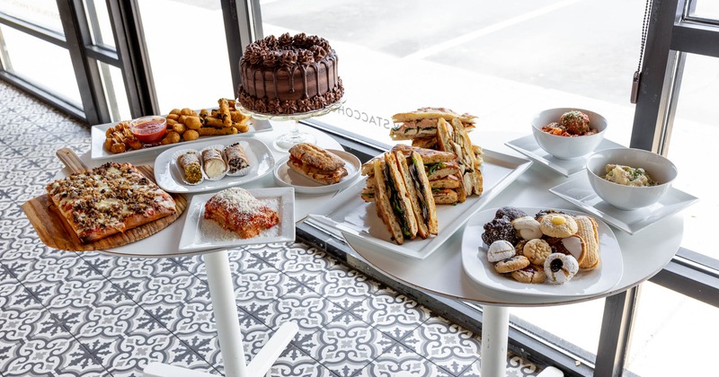 Two tables with assorted dishes