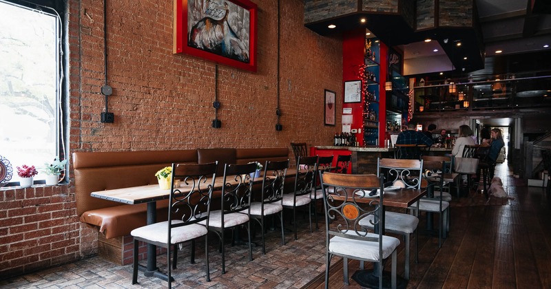 Interior, tables and chairs in dining area