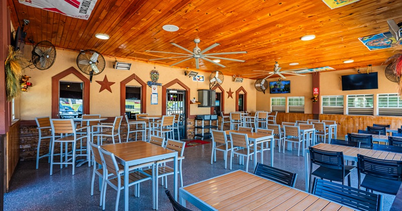 Covered seating area with chairs and tables
