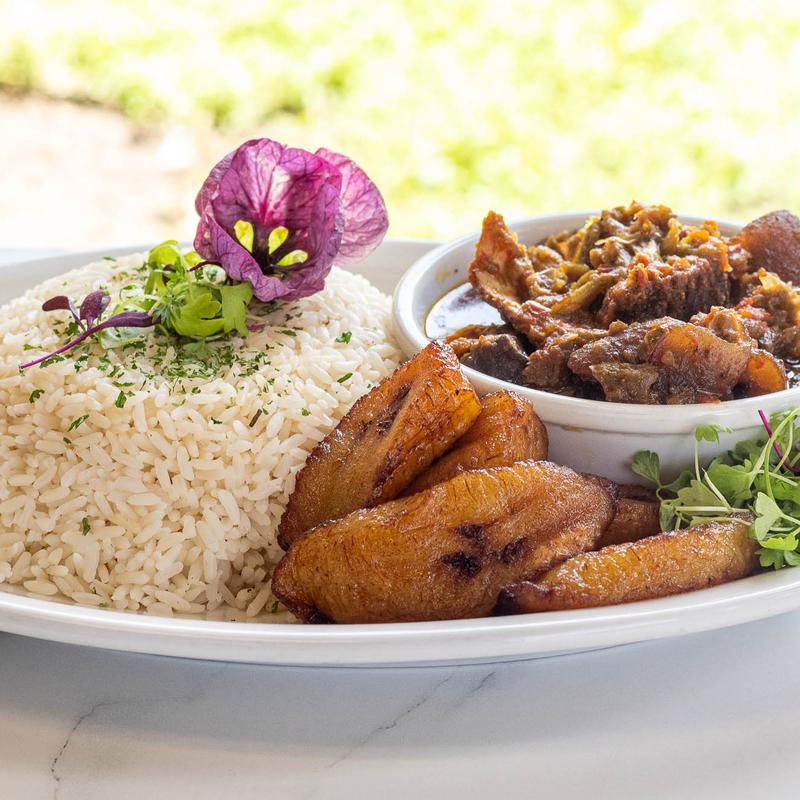 Spicy Ofada Sauce Served with White Rice and Fried Plantains photo