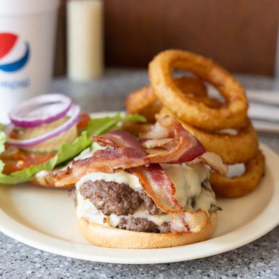 Double bacon cheese burger  with onion rings.