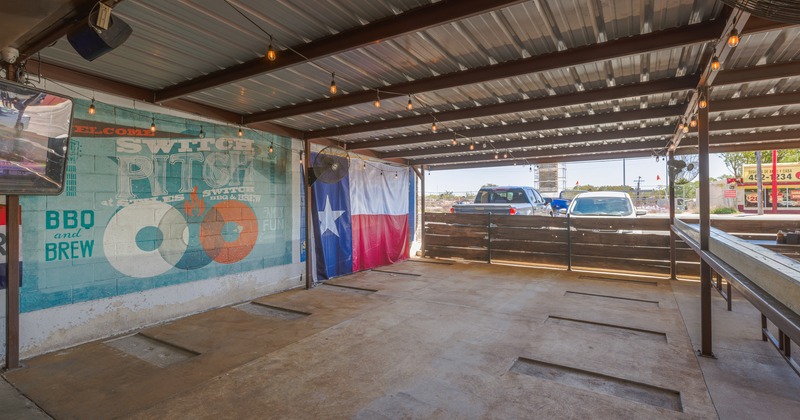 Covered outdoor area, parking lot outside