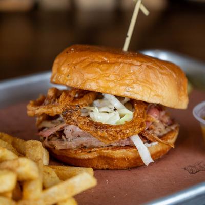 Slaw-Ter House, smoked brisket and pulled pork sandwich.