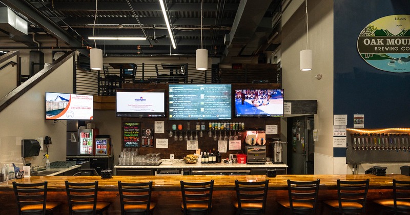 Interior, bar counter area, big Tv's