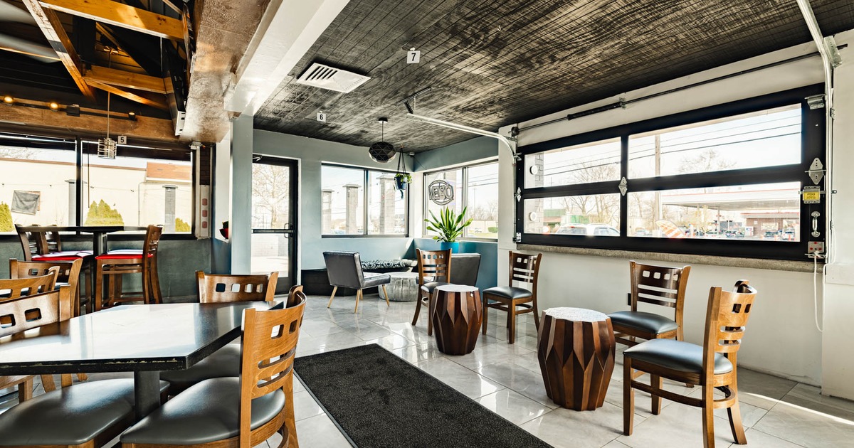Interior, tables and chairs near windows