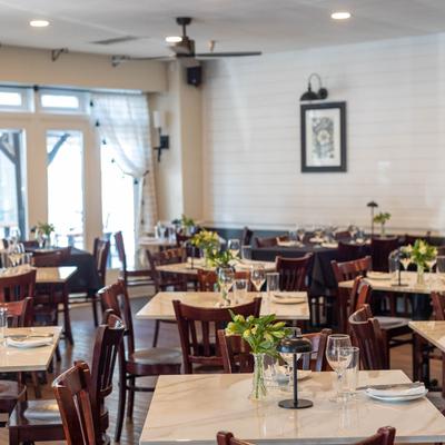 The restaurant's interior, tables and chairs.