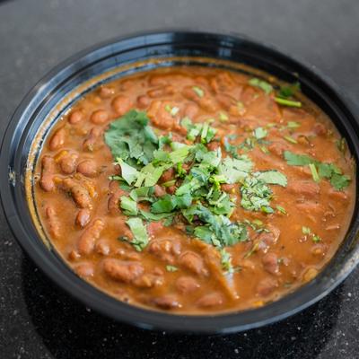 Kidney bean curry topped with cilantro.