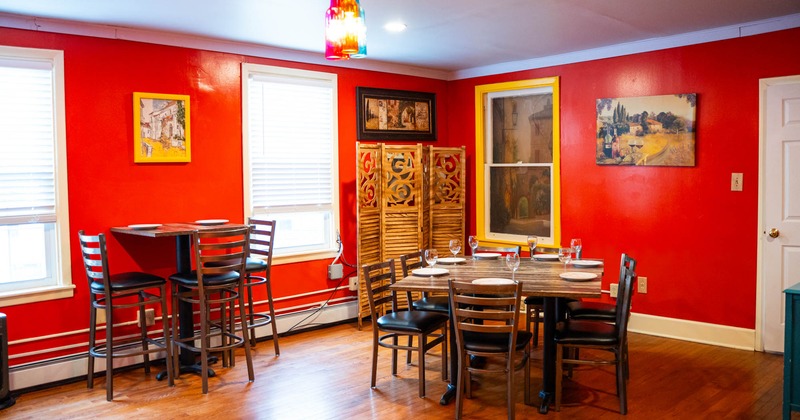 Interior, chairs and tables, painting on the wall