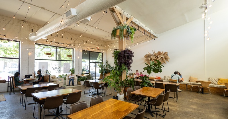 A bright and spacious industrial-style cafe interior space