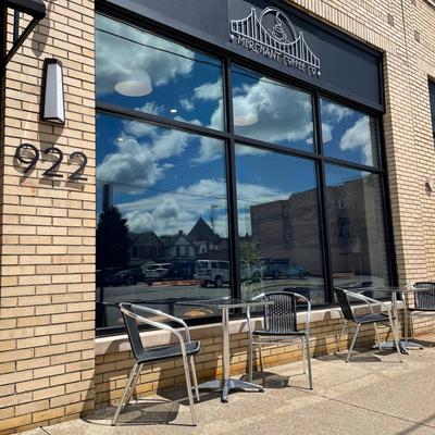 The restaurant's windows from the outside.