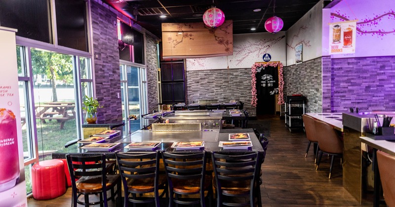 Interior of a modern restaurant with a large dining table