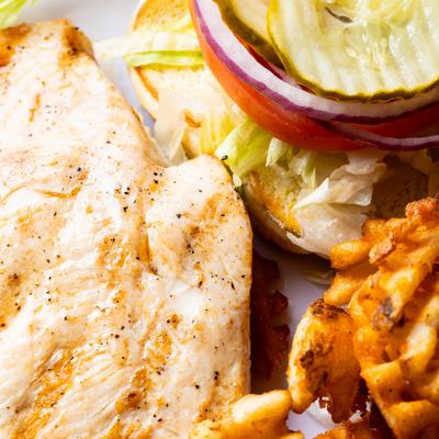 Grilled tenderloin with your choice of side like waffle fries as pictured here.