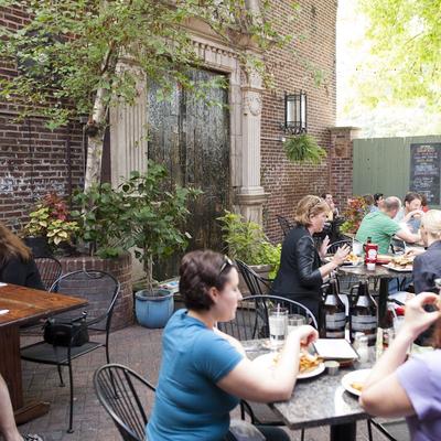 Exterior, seating area, customers dining.