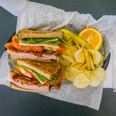 Sandwich with a side of chips, top view.