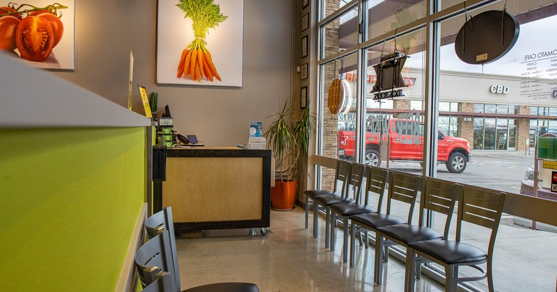 Interior, ordering counter and chairs by the window